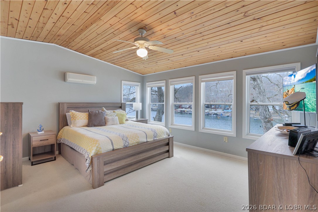 29966 Oak Knoll Road Rocky Mount, MO 65072 - Photo 21 of 59 The expansive primary bedroom features the same na