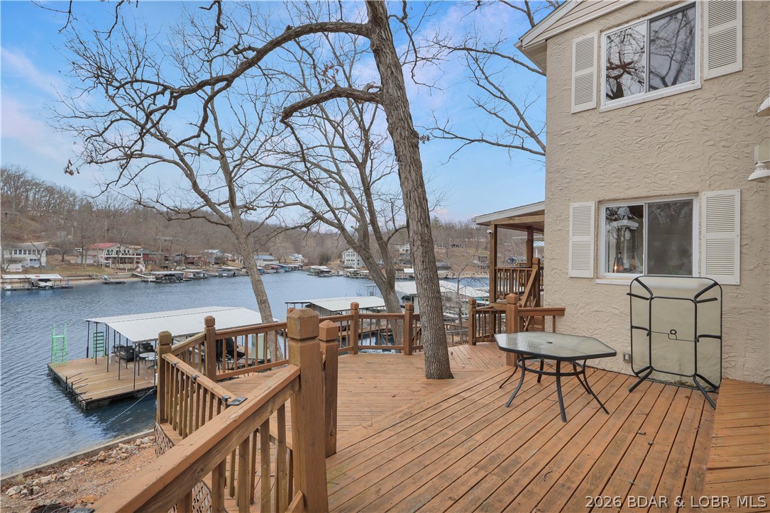 29966 Oak Knoll Road Rocky Mount, MO 65072 - Photo 3 of 59 The deck features at least two distinct levels, pr