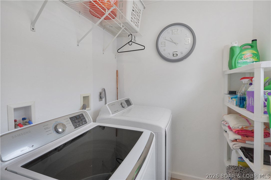 29966 Oak Knoll Road Rocky Mount, MO 65072 - Photo 33 of 59 Laundry room on upper entry level provides easy ac