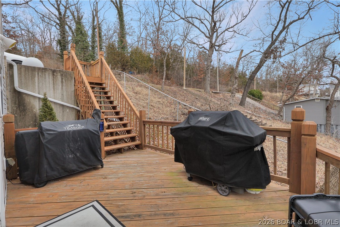 29966 Oak Knoll Road Rocky Mount, MO 65072 - Photo 37 of 59 First level of lakeside deck space. Plenty of room