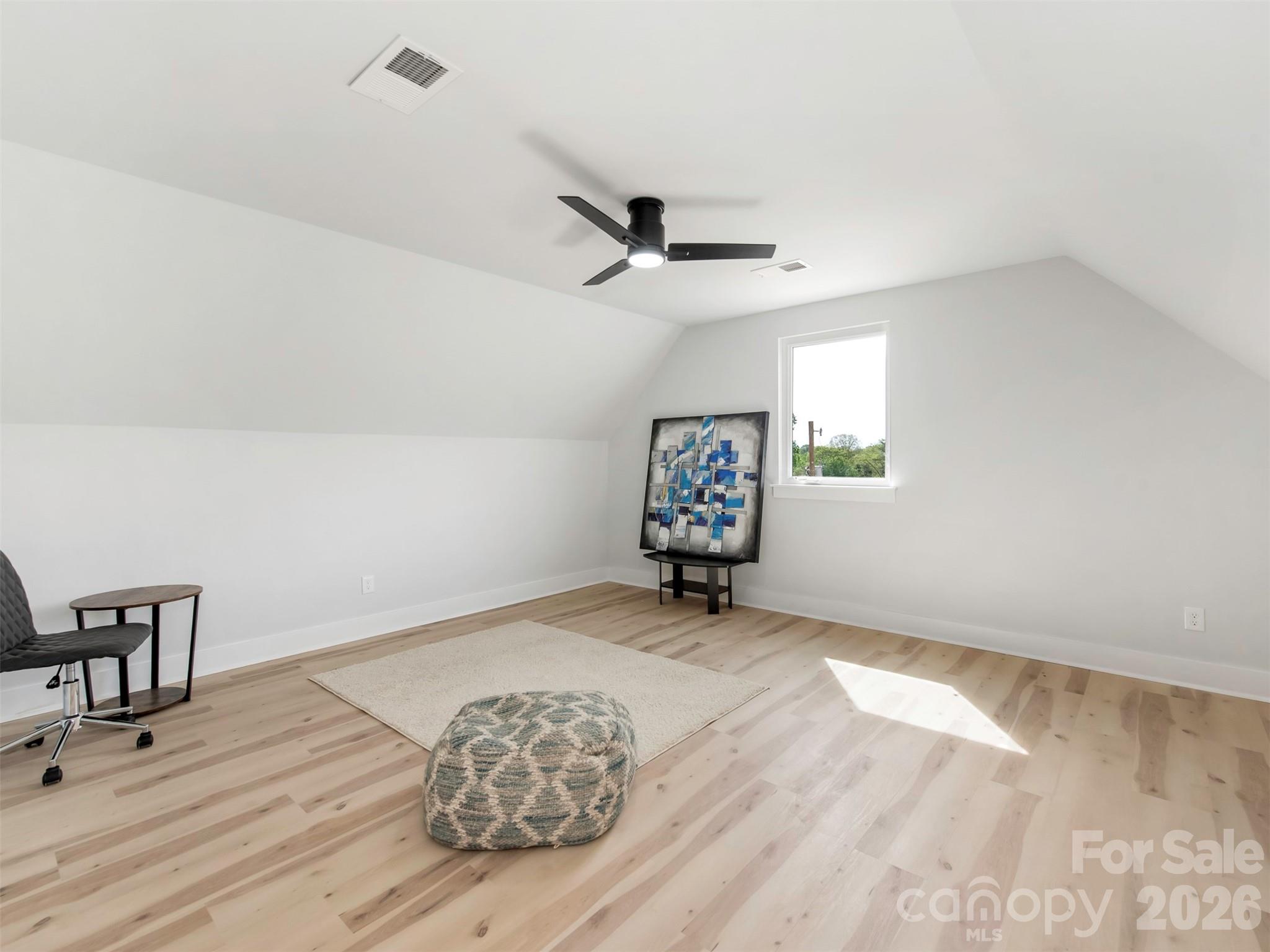 12133 Coyle Road Stanfield, NC 28163 - Photo 30 of 43 a view of a room with wooden floor and a window