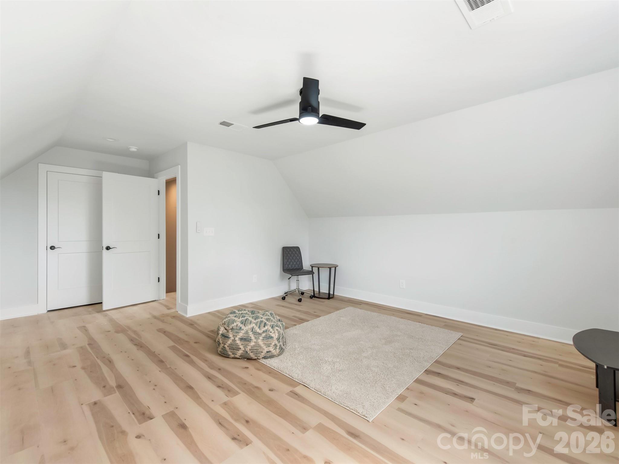 12133 Coyle Road Stanfield, NC 28163 - Photo 32 of 43 a bedroom with a bed and a window