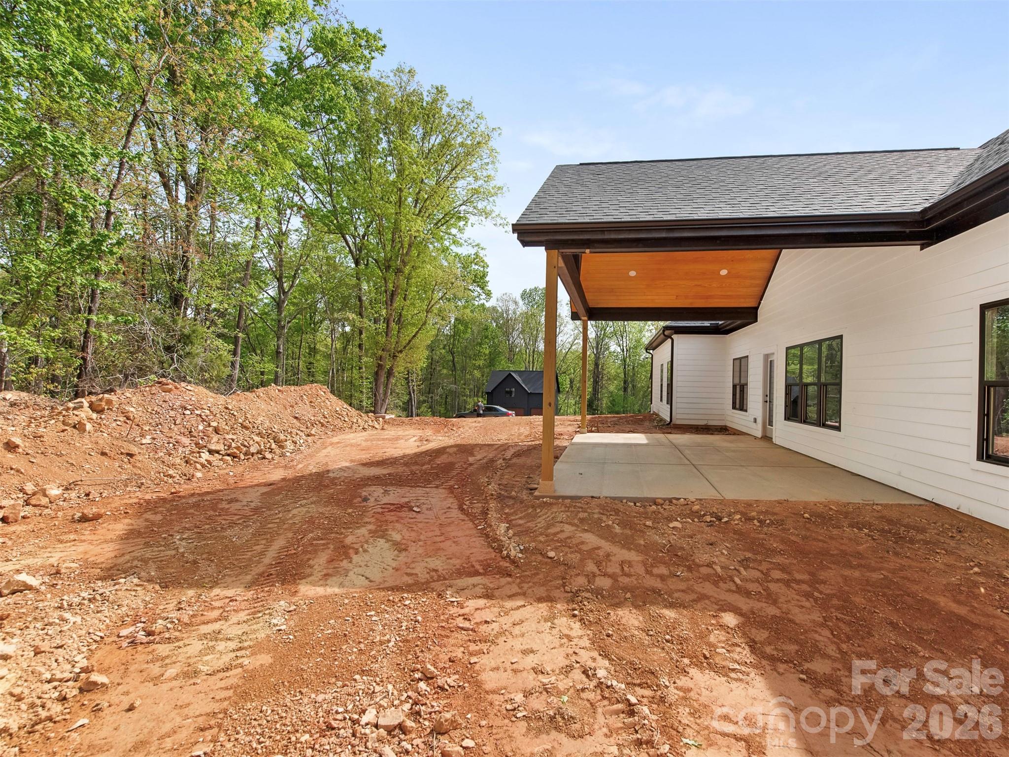 12133 Coyle Road Stanfield, NC 28163 - Photo 38 of 43 a view of a house with a outdoor space