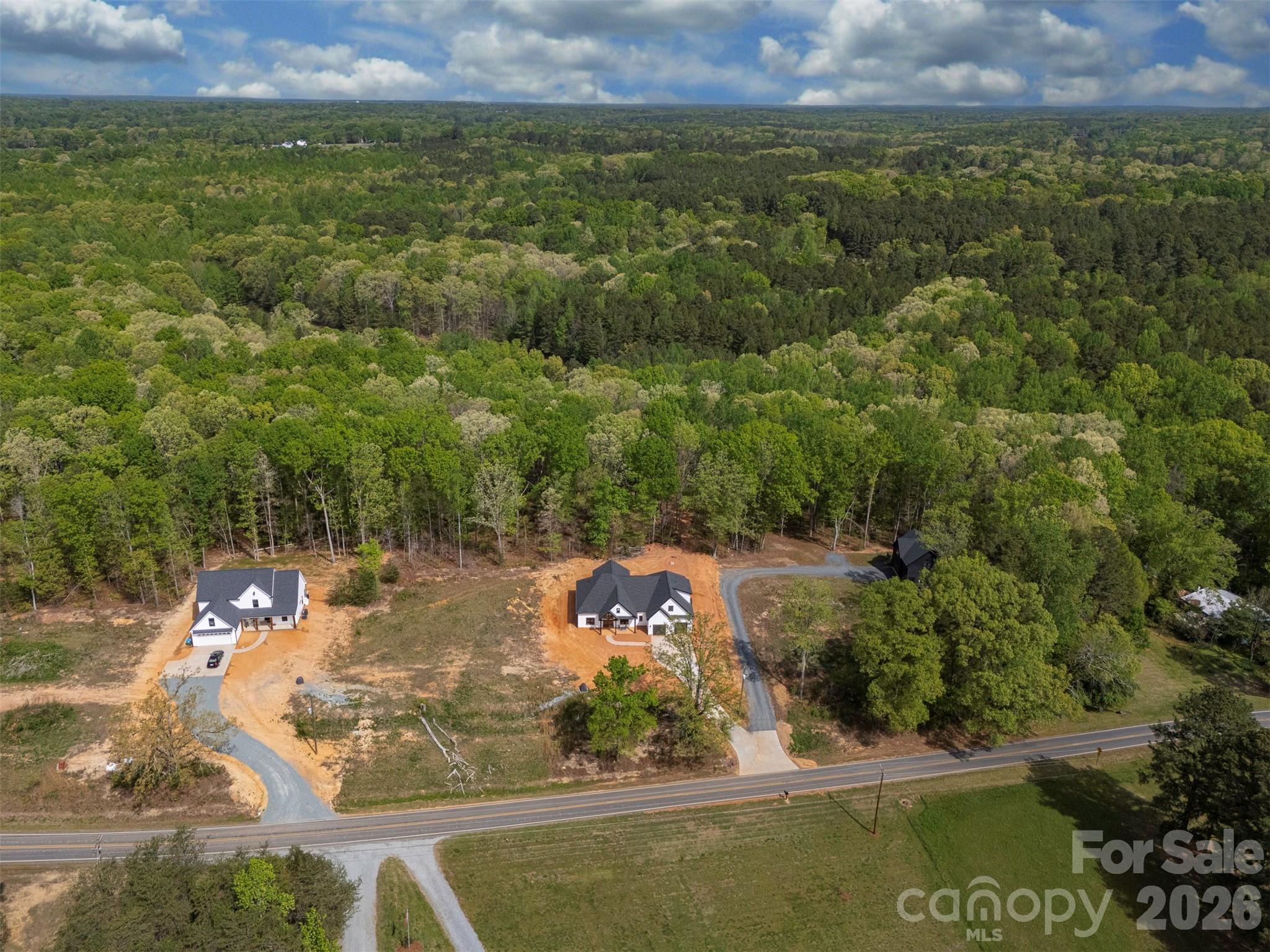 12133 Coyle Road Stanfield, NC 28163 - Photo 42 of 43 an aerial view of a house with a yard