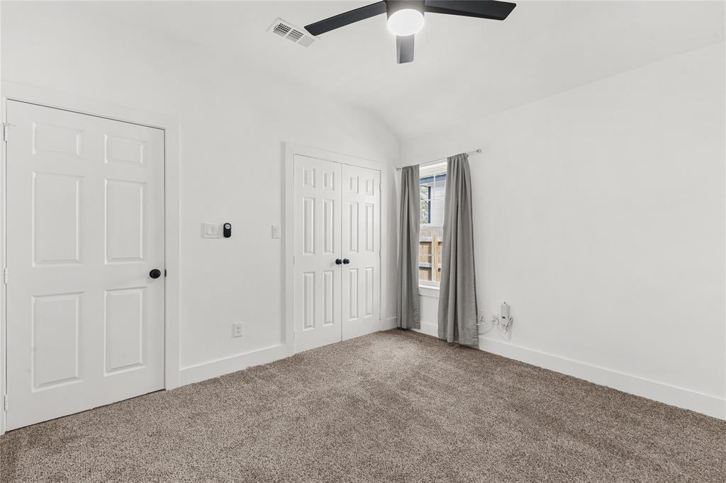 101 Ross Street Sulphur Springs, TX 75482 - Photo 21 of 29 an empty room with ceiling fan