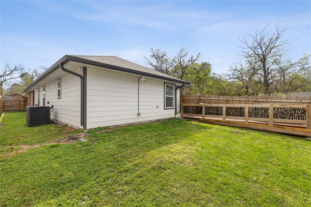 101 Ross Street Sulphur Springs, TX 75482 - Photo 26 of 29 a view of a backyard with garden