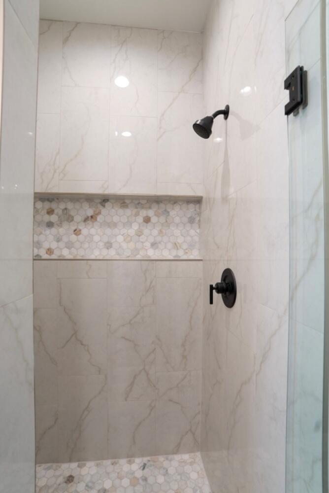 4620 143rd Street Lubbock, TX 79424 - Photo 20 of 25 a bathroom with a shower
