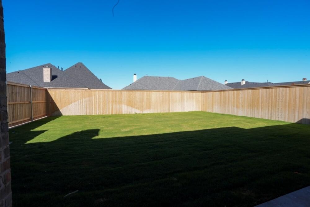 4620 143rd Street Lubbock, TX 79424 - Photo 25 of 25 a view of a big house with a big yard