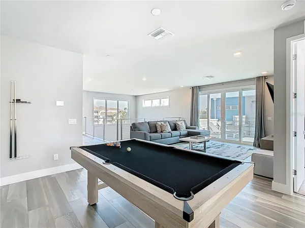 a room with furniture and a flat screen tv