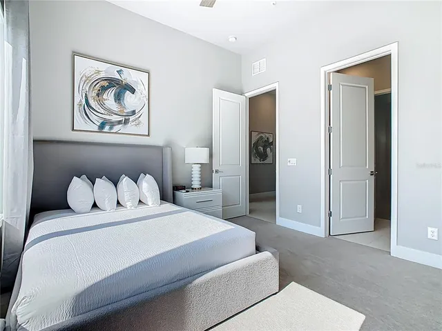 a view of a hallway with washer and dryer