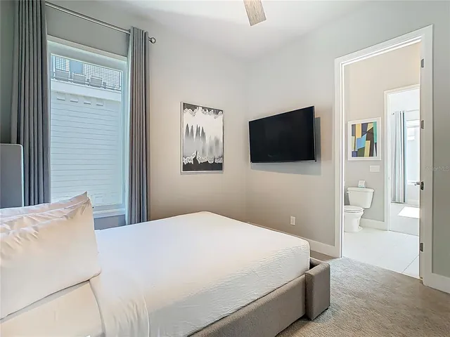 an aerial view of a house with a garden