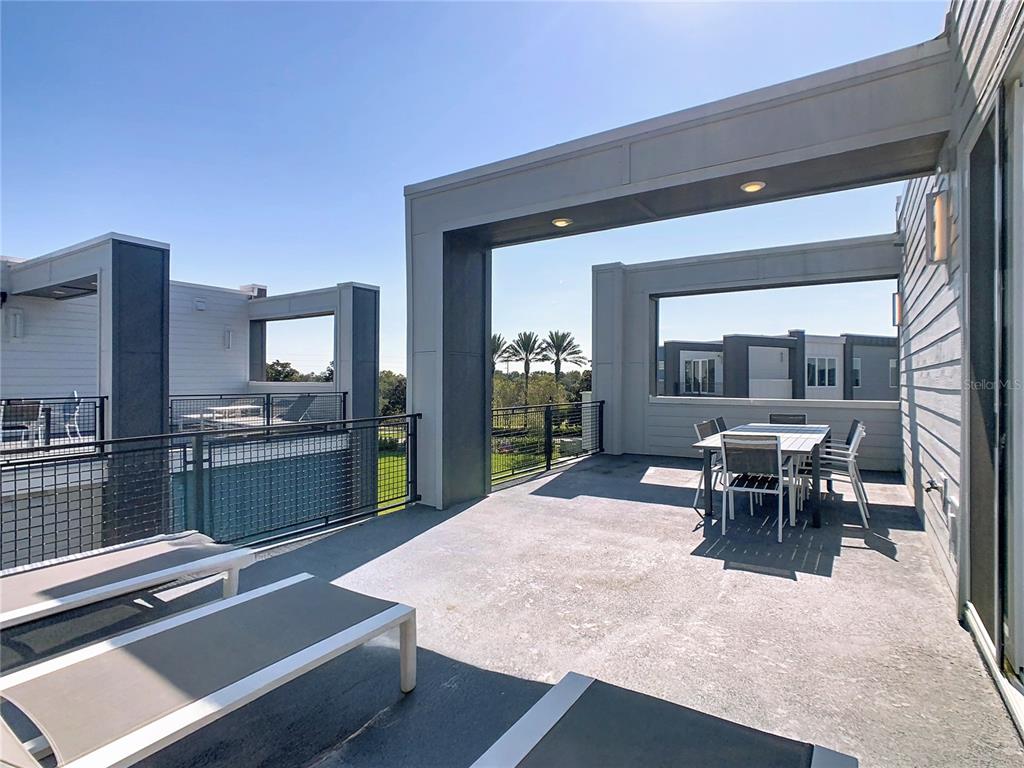 7740 Sandy Ridge Drive, Unit 245 Reunion, FL 34747 - Photo 50 of 57 a view of a dining room with furniture window and outside view