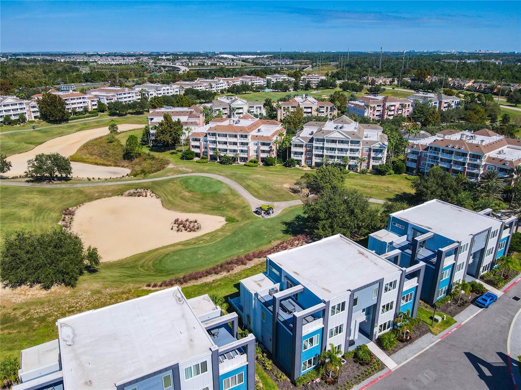 7740 Sandy Ridge Drive, Unit 245 Reunion, FL 34747 - Photo 55 of 57 an aerial view of a house with a garden