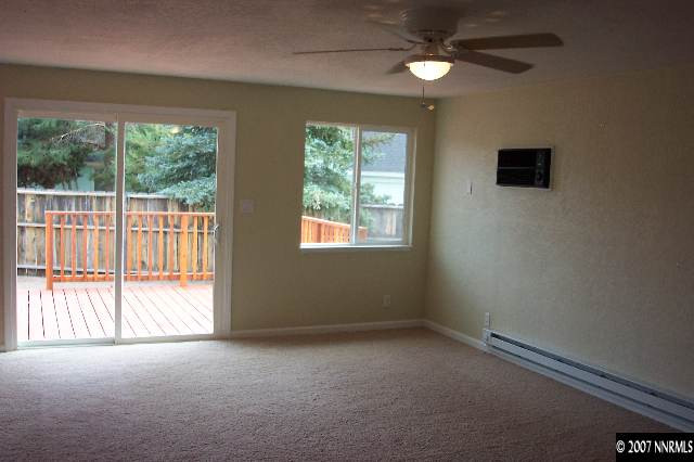 17460 Cold Springs Drive Reno, NV 89508 - Photo 8 of 9 a view of an empty room with a window