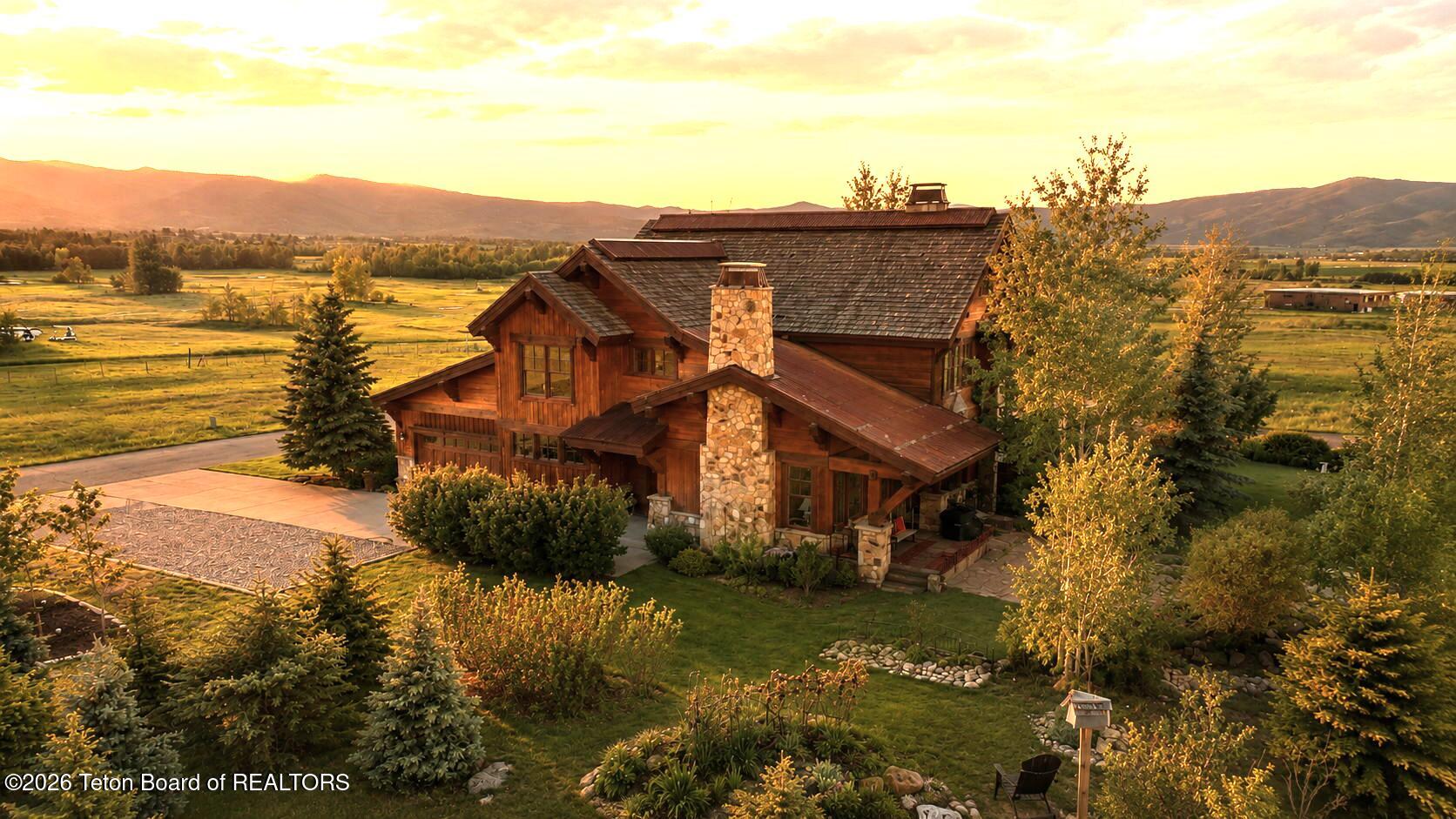 92 Bison Drive Victor, ID 83455 - Photo 52 of 52 60 front at sunset from east