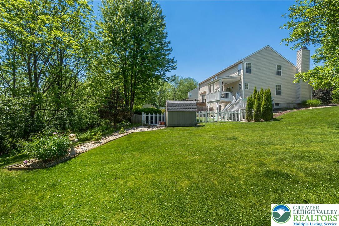 2314 Red Maple Drive Coplay, PA 18037 - Photo 70 of 73 A tiered backyard with a deck and detached shed provides ample space for outdoor enjoyment.