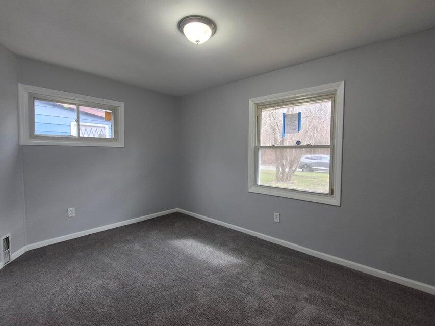 3326 Delaware Street Gary, IN 46409 - Photo 5 of 14 an empty room with windows