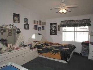2963 Santa Rosa Avenue, Unit B5 Santa Rosa, CA 95407 - Photo 5 of 6 a bedroom with a bed and window