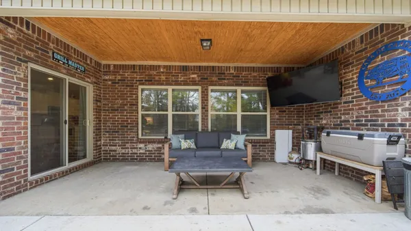 a front view of a house with patio