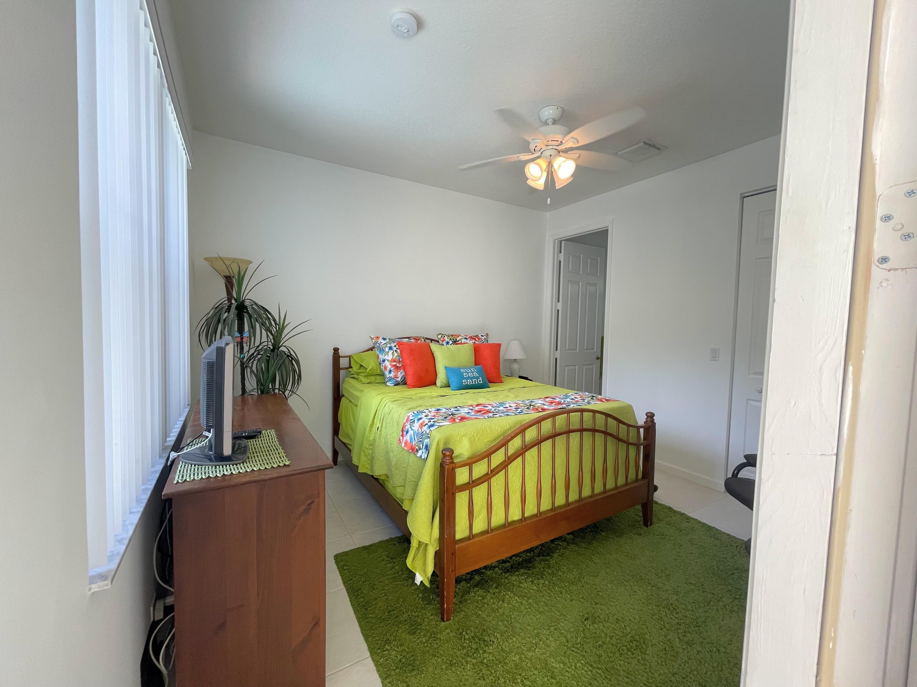 7060 Northwest Turtle Walk Boca Raton, FL 33487 - Photo 45 of 51 Courtyard House bedroom