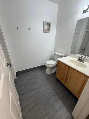 a bathroom with a sink and a toilet