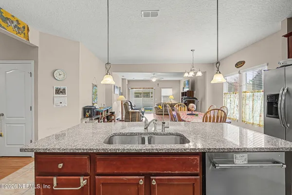a view of a house with a swimming pool