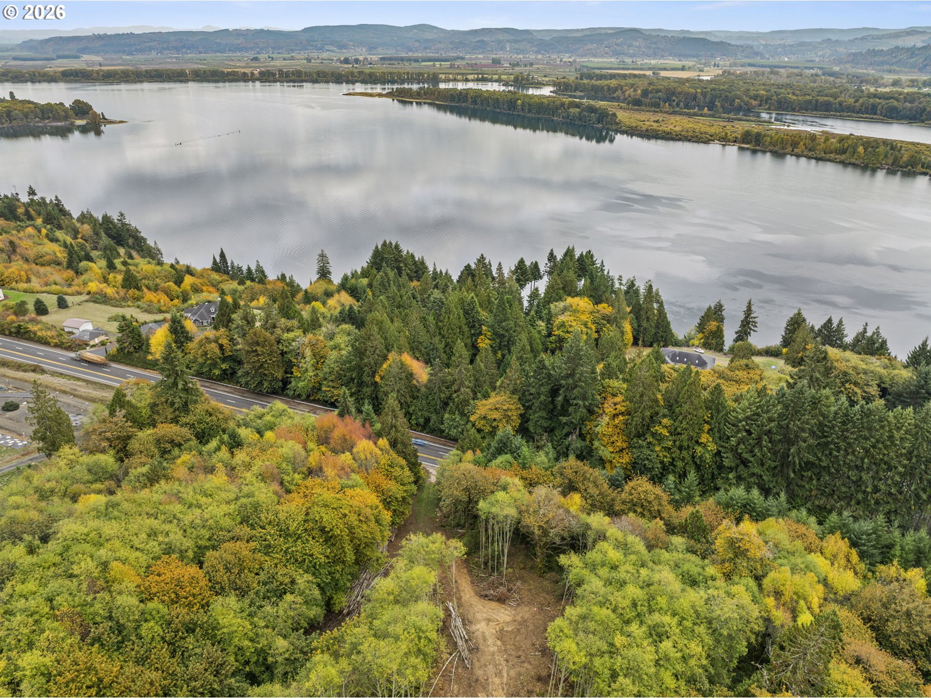 4 East State Route Cathlamet, WA 98612 - Photo 2 of 20 a view of a lake with a mountain in the background and lake view