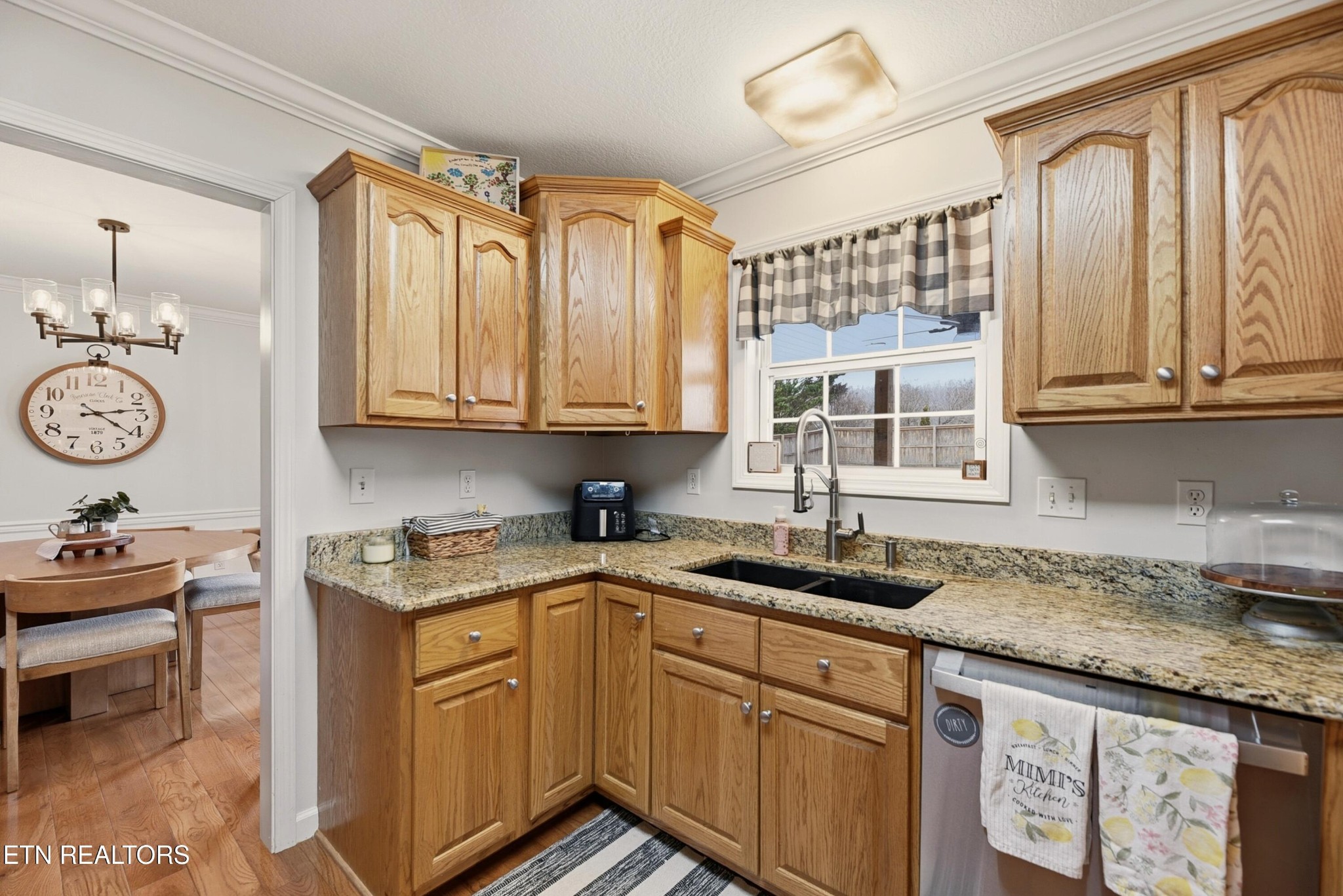 117 Elizabethton Way Clinton, TN 37716 - Photo 13 of 41 a kitchen with stainless steel appliances granite countertop a sink stove and cabinets
