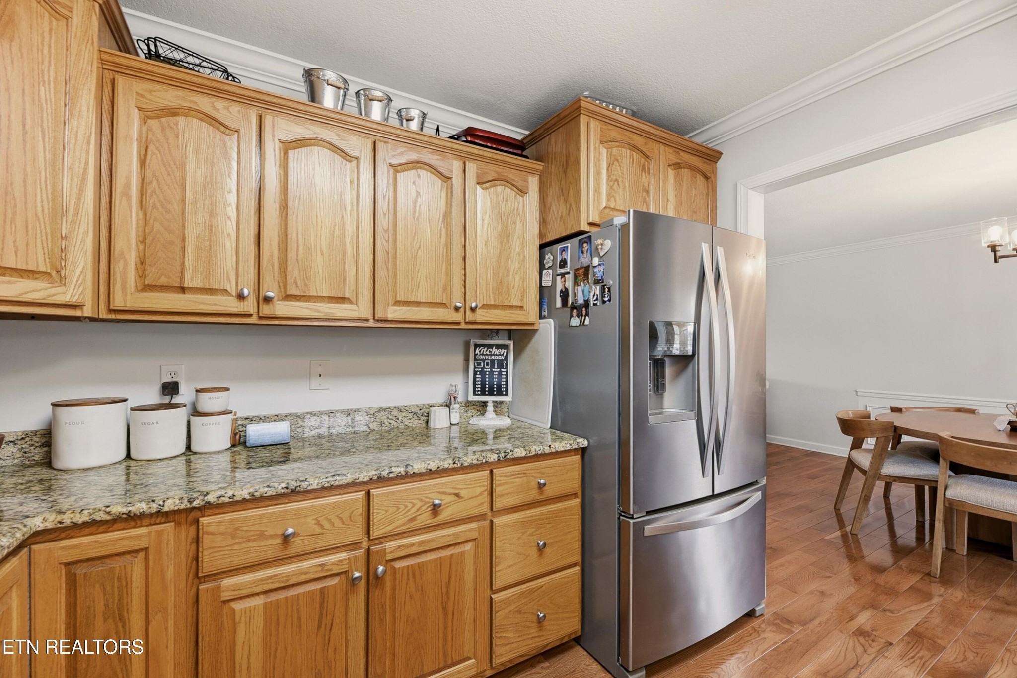 117 Elizabethton Way Clinton, TN 37716 - Photo 14 of 41 a kitchen with stainless steel appliances granite countertop a refrigerator and a stove top oven