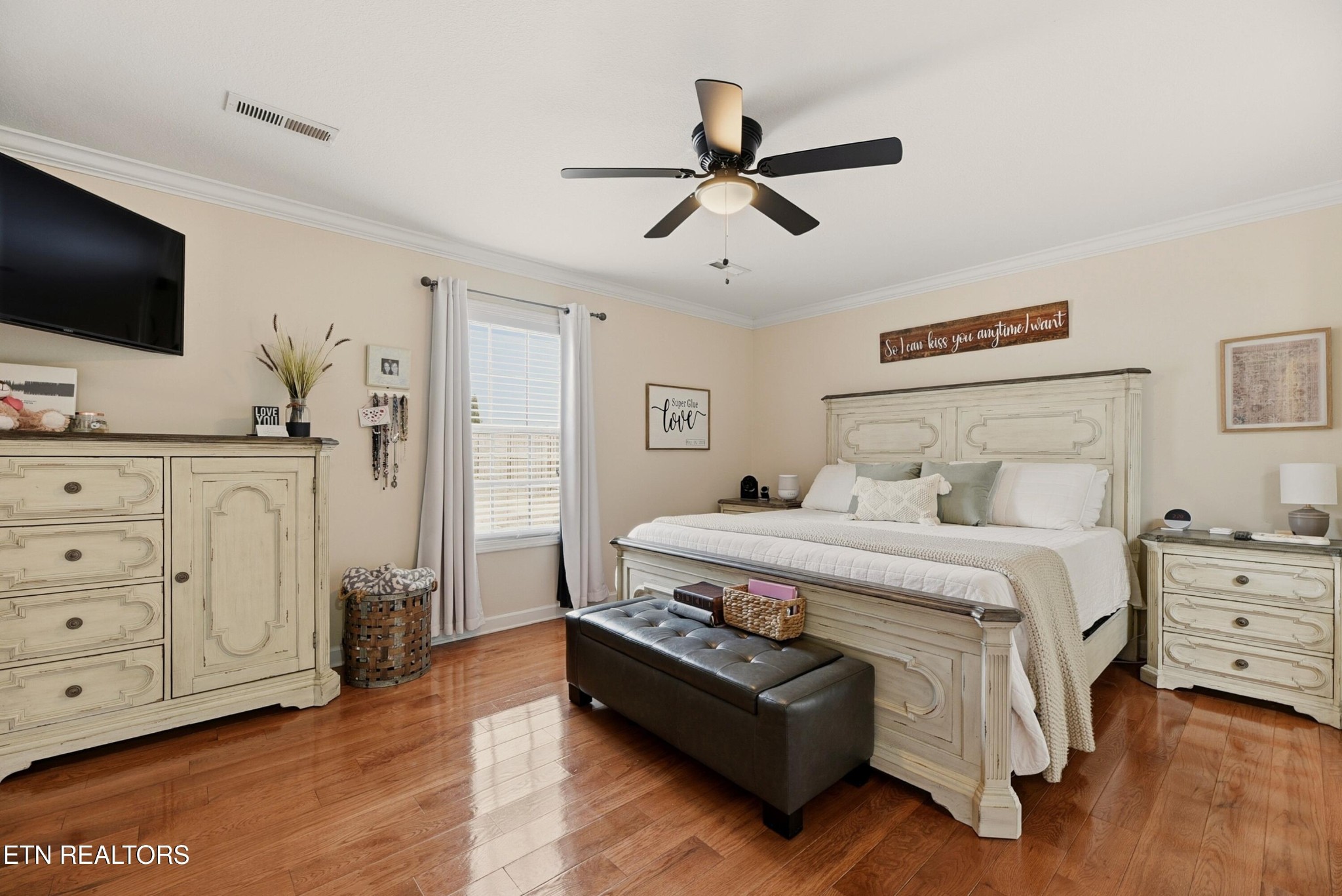 117 Elizabethton Way Clinton, TN 37716 - Photo 19 of 41 a bedroom with a bed and a flat screen tv