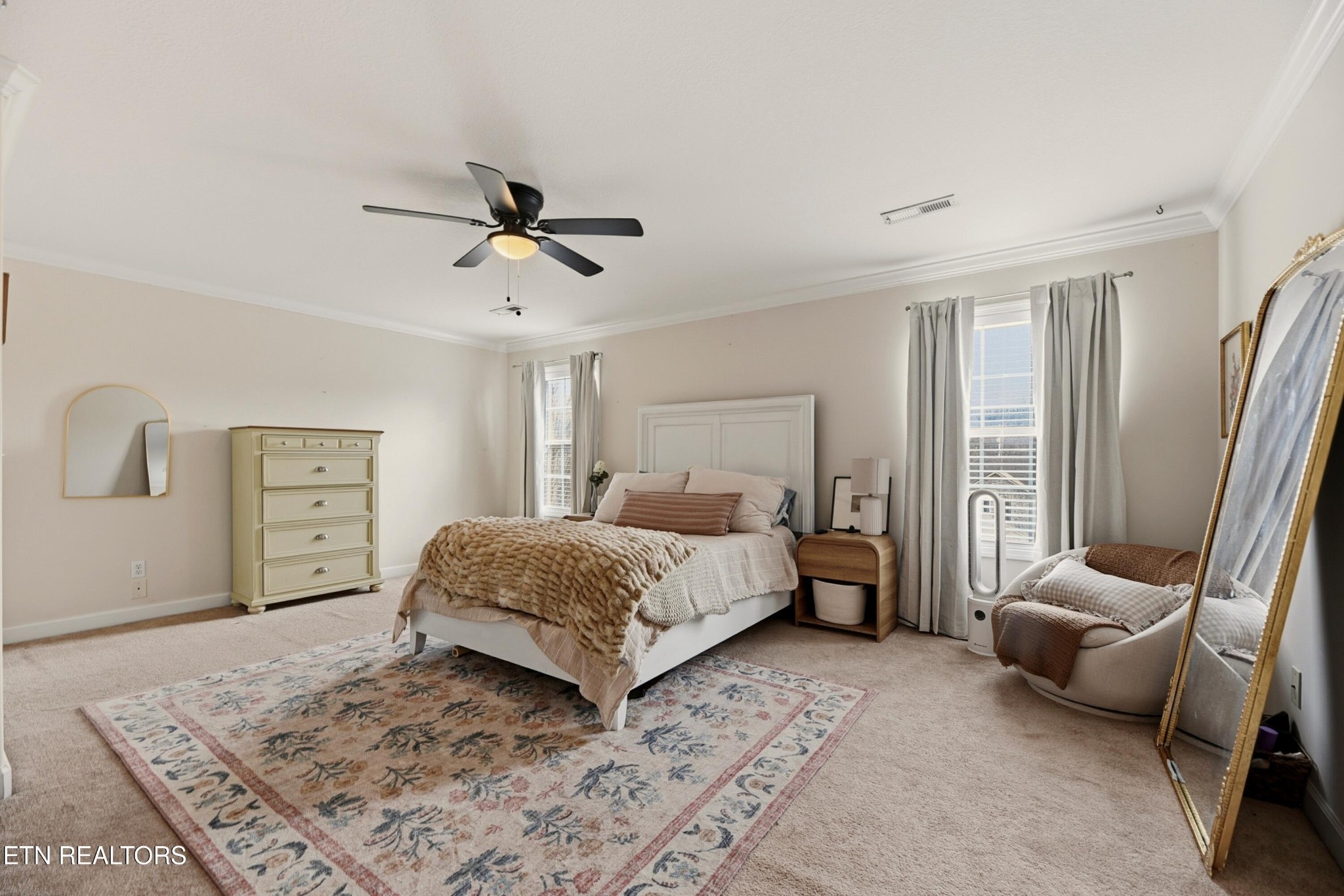 117 Elizabethton Way Clinton, TN 37716 - Photo 30 of 41 a bedroom with a bed and wooden floor