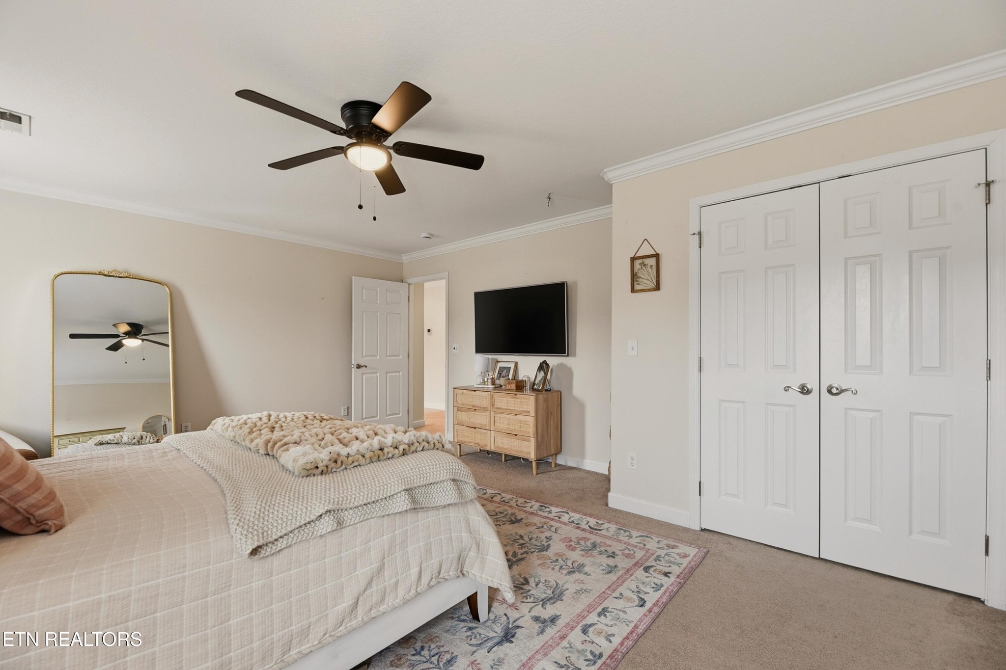 117 Elizabethton Way Clinton, TN 37716 - Photo 31 of 41 a bedroom with a bed and a flat screen tv