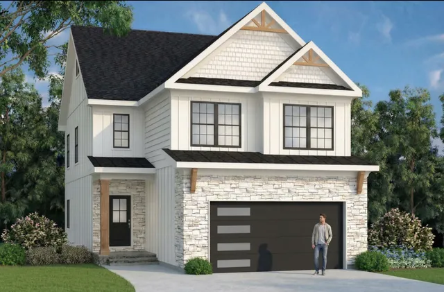 a front view of a house with yard