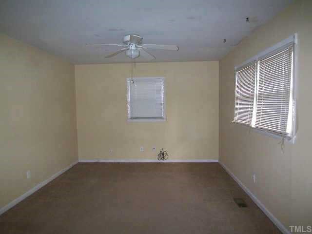 716 Oak Road Raleigh, NC 27603 - Photo 3 of 6 an empty room with a window