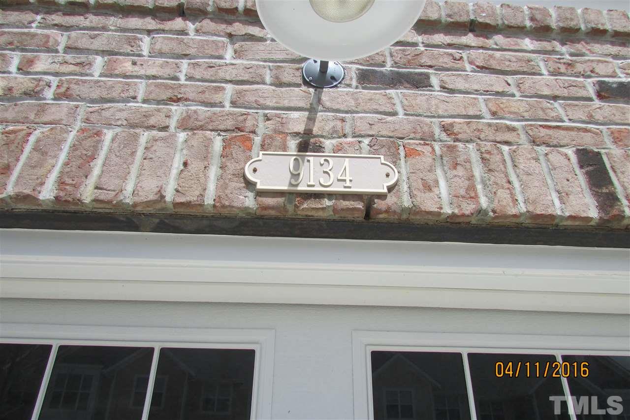 9134 Wooden Road Raleigh, NC 27617 - Photo 23 of 25 Garage entrance to home on 9134 Wooden Rd. Lock box on front door. Please enter from front on Bruckhauser