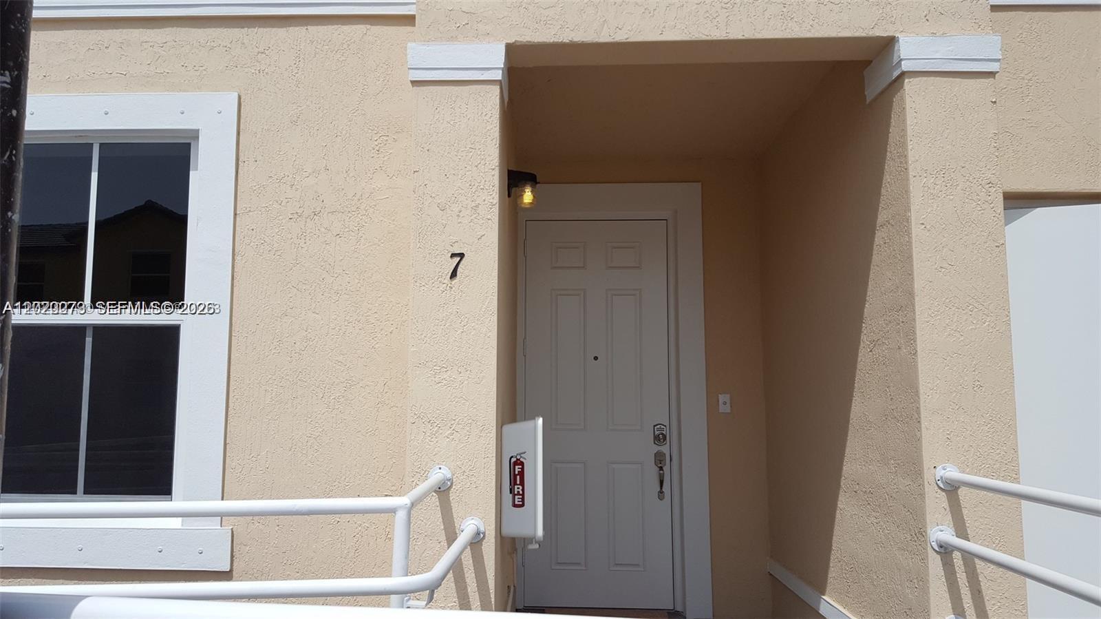 142 Northeast 28th Terrace, Unit 7 Homestead, FL 33033 - Photo 2 of 17 a view of balcony