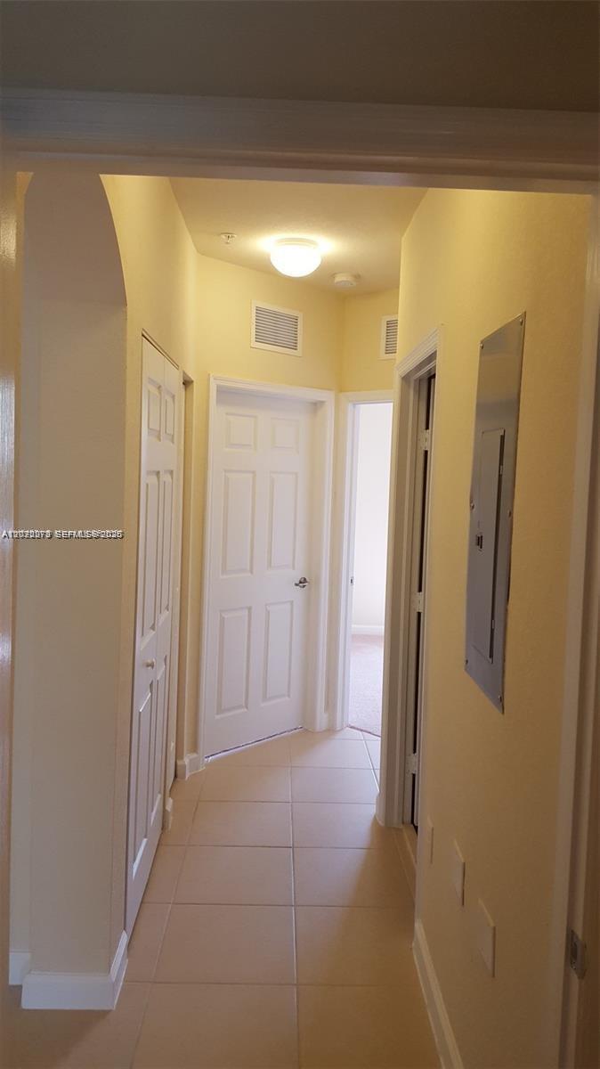 142 Northeast 28th Terrace, Unit 7 Homestead, FL 33033 - Photo 7 of 17 a bathroom with a shower and a tub