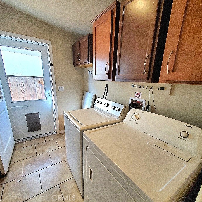 21621 Sandia Road, Unit 127 Apple Valley, CA 92308 - Photo 15 of 43 a utility room with dryer and washer
