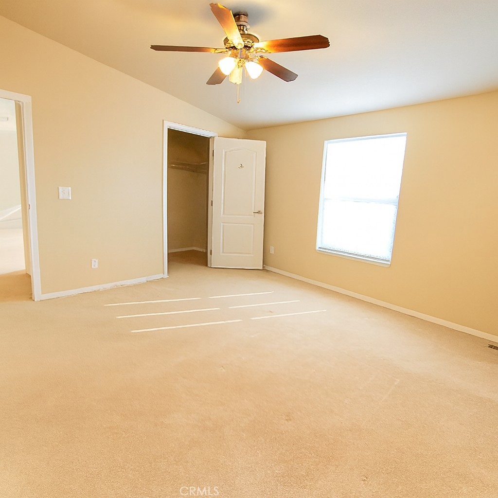 21621 Sandia Road, Unit 127 Apple Valley, CA 92308 - Photo 17 of 43 a view of an empty room with a window