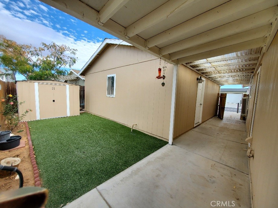 21621 Sandia Road, Unit 127 Apple Valley, CA 92308 - Photo 23 of 43 a view of a back yard of the house