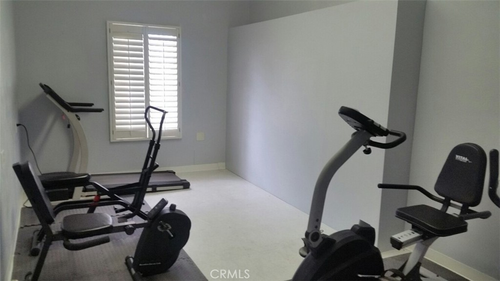 21621 Sandia Road, Unit 127 Apple Valley, CA 92308 - Photo 36 of 43 a view of a room with gym equipment