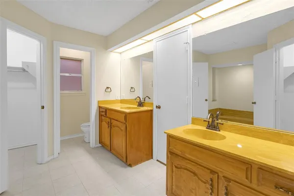 a view of storage and utility room with washer and dryer