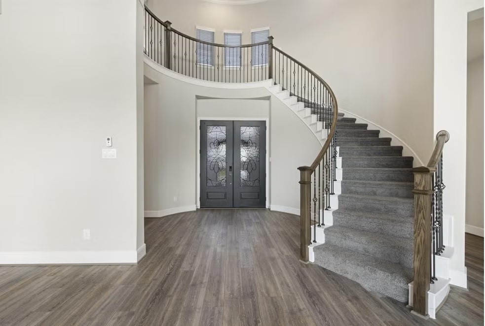 6418 Seville Street Manvel, TX 77578 - Photo 2 of 7 a view of entryway with wooden floor
