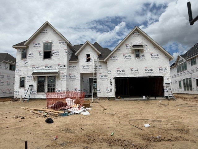 6418 Seville Street Manvel, TX 77578 - Photo 7 of 7 a front view of a house with yard and garage