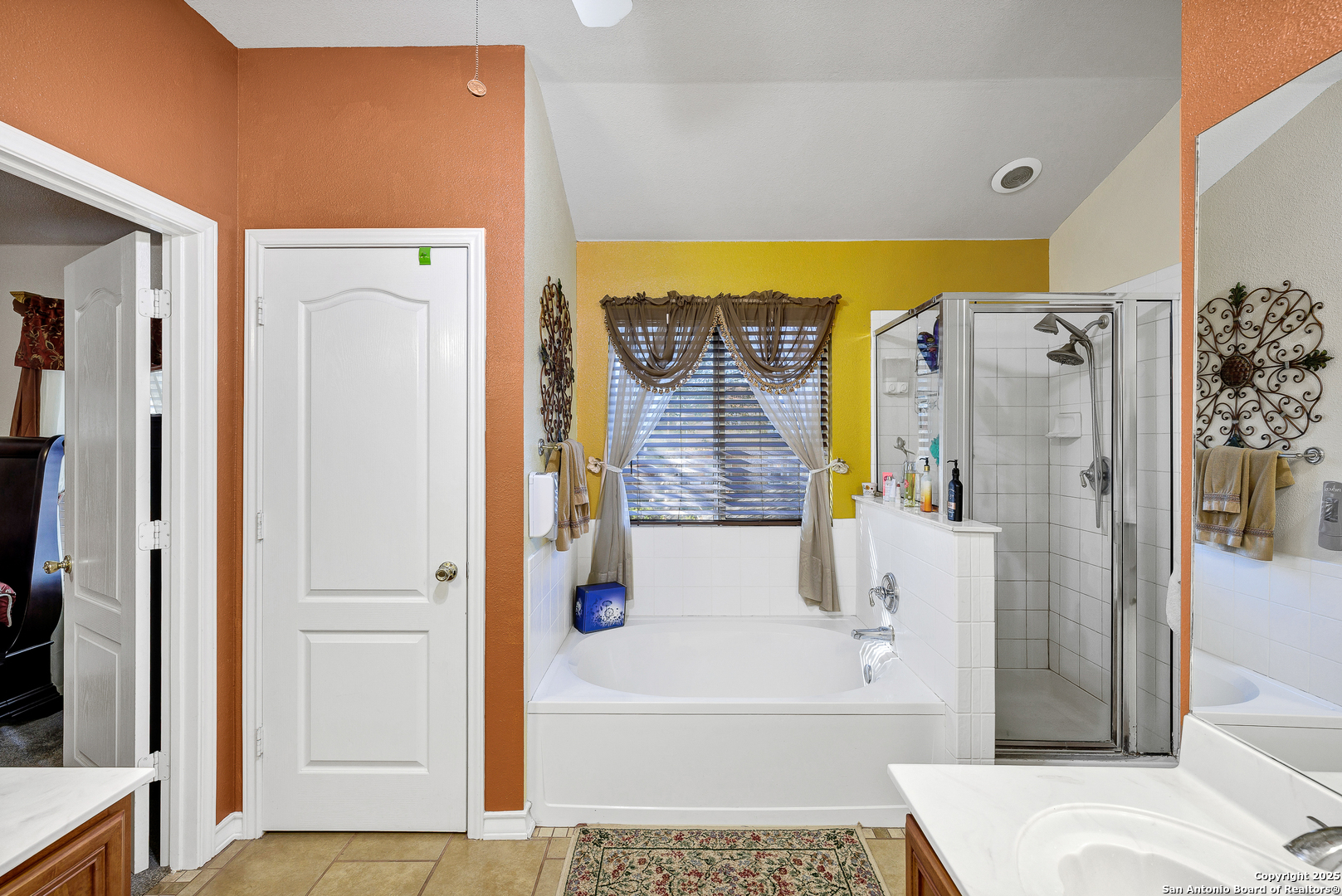 1611 Springhouse Street San Antonio, TX 78251 - Photo 13 of 30 a bathroom with a bathtub and shower