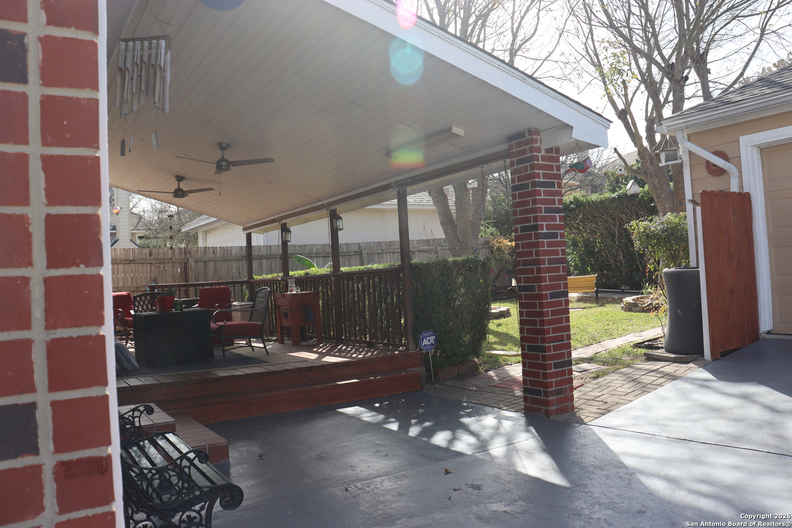 1611 Springhouse Street San Antonio, TX 78251 - Photo 25 of 30 a view of a porch with a table and chairs