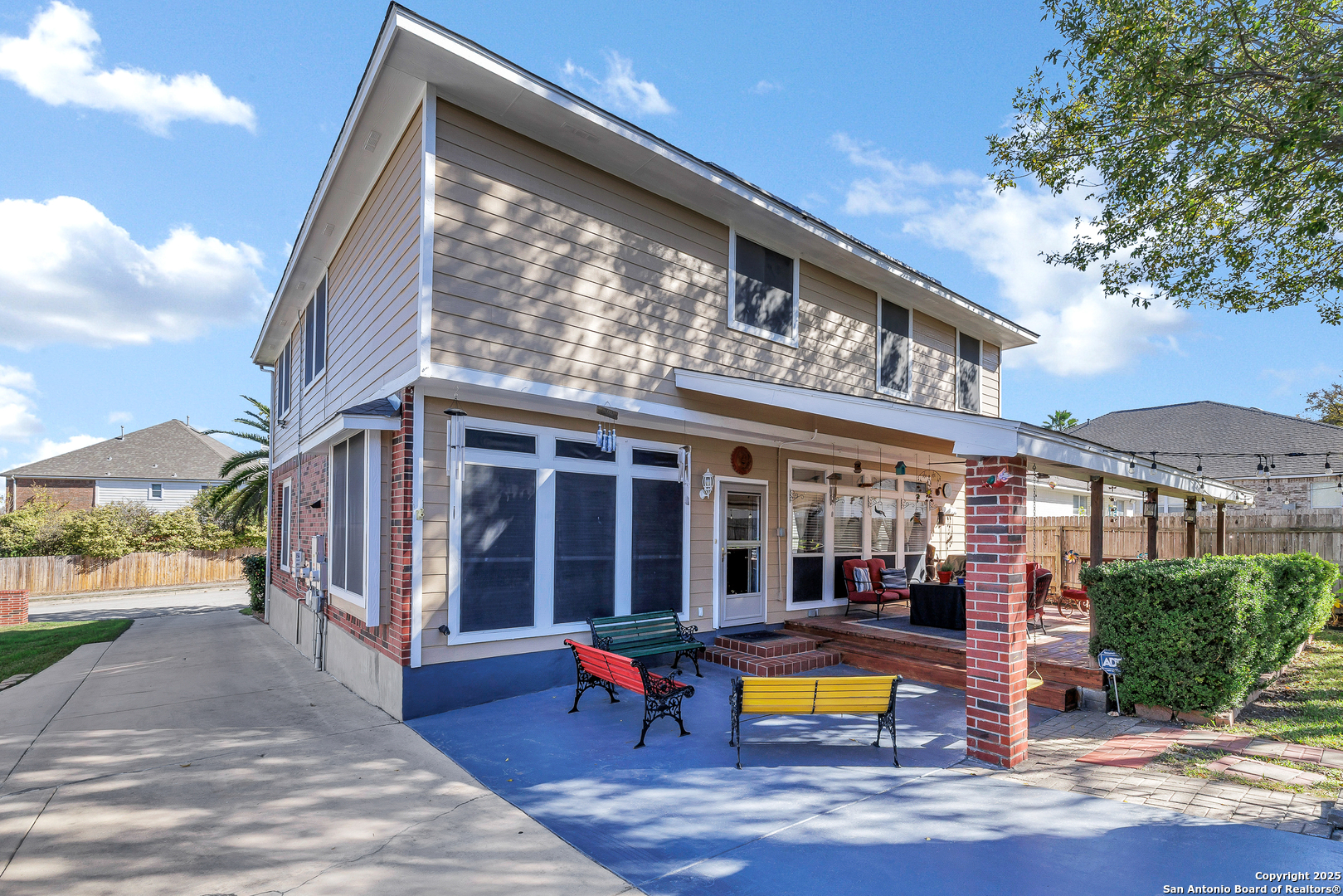 1611 Springhouse Street San Antonio, TX 78251 - Photo 26 of 30 a view of a building with sitting area and garden