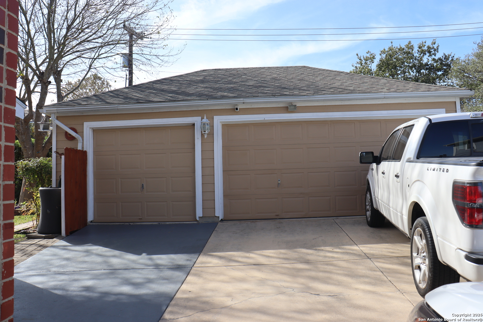 1611 Springhouse Street San Antonio, TX 78251 - Photo 3 of 30 a view of garage with a washer and dryer