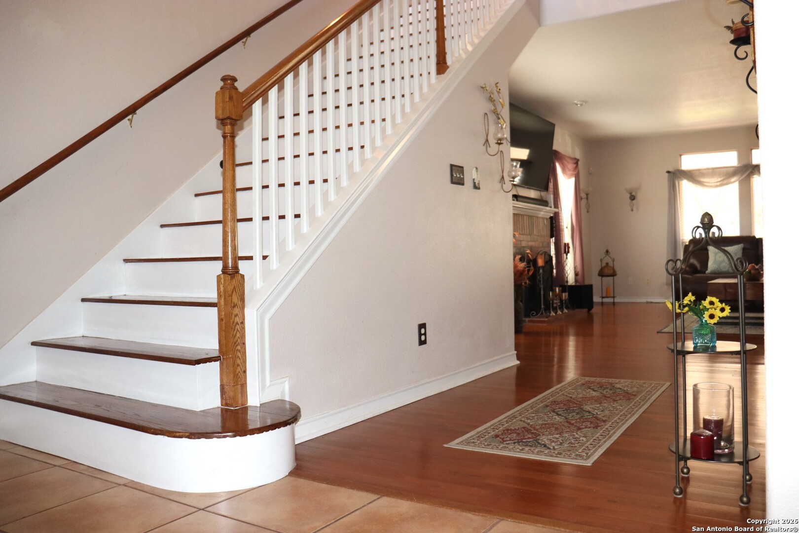 1611 Springhouse Street San Antonio, TX 78251 - Photo 5 of 30 a view of entryway and hall with wooden floor