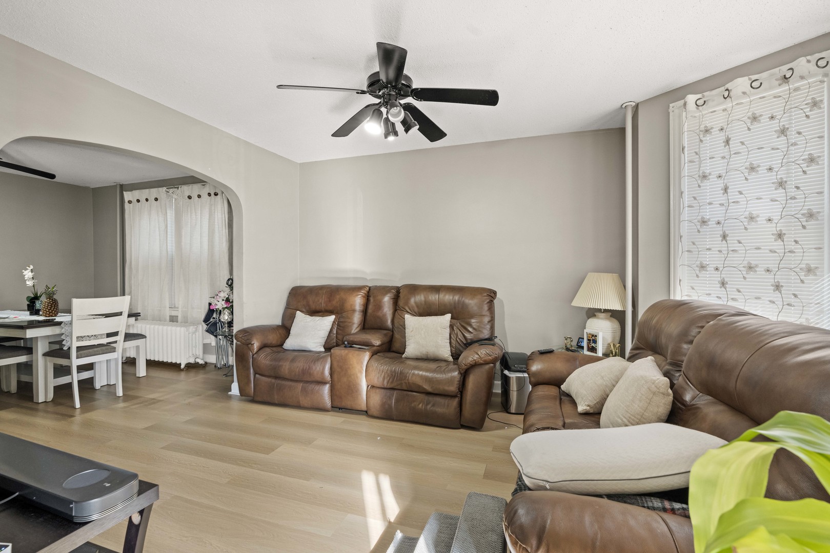 2922 East 97th Street Chicago, IL 60617 - Photo 11 of 20 a living room with furniture and a large window